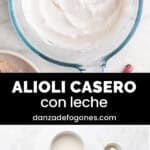 Jarra de alioli con leche con ajos alrededor.